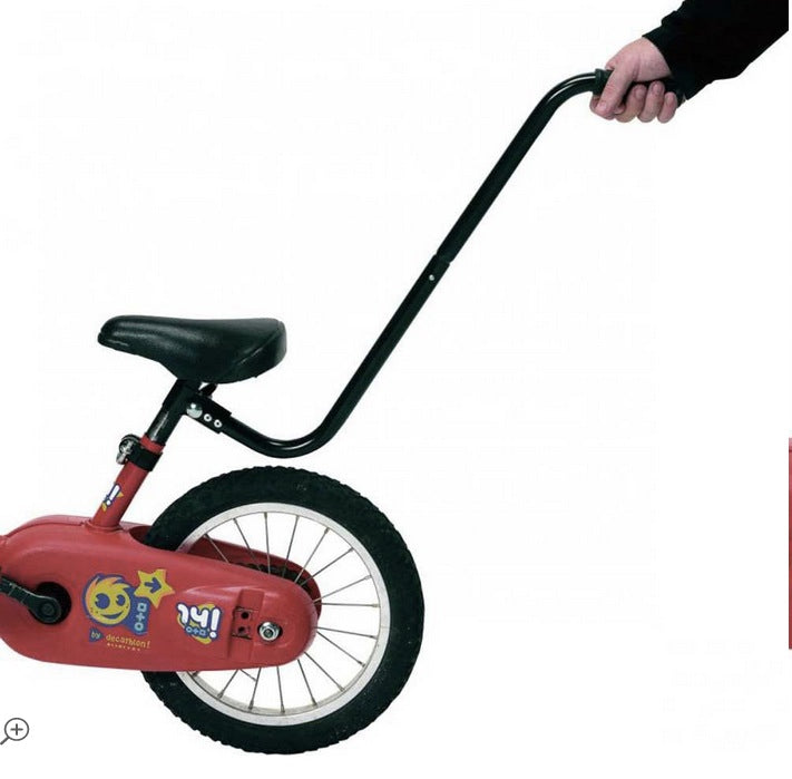 Soporte de bicicleta infantil que permite su empuje 
